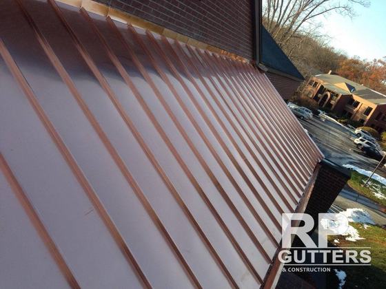 Long copper standing-seam roof panels