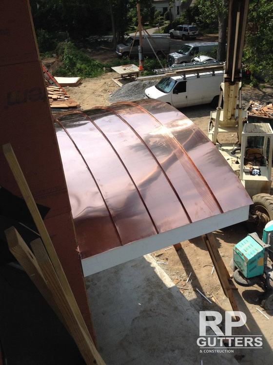 Curved copper standing-seam roof section