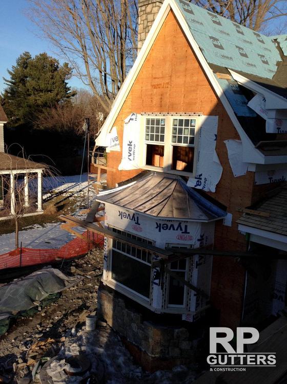 Copper roof canopy on a home under construction