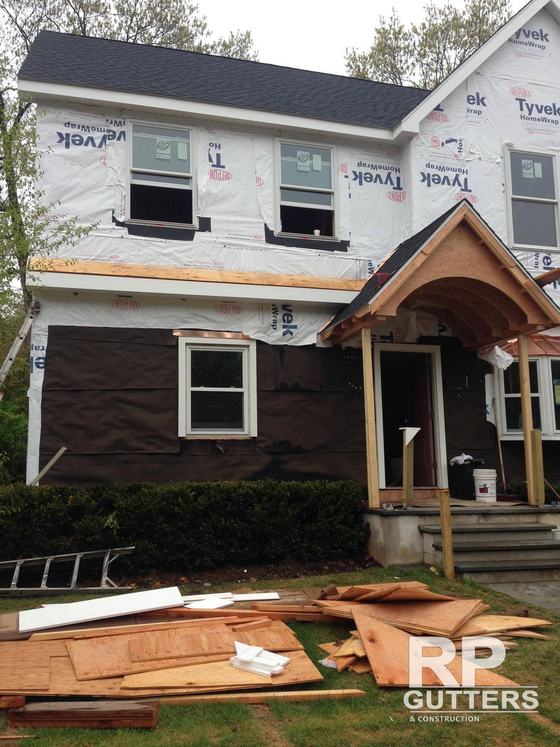Entry porch roof framing on a new addition
