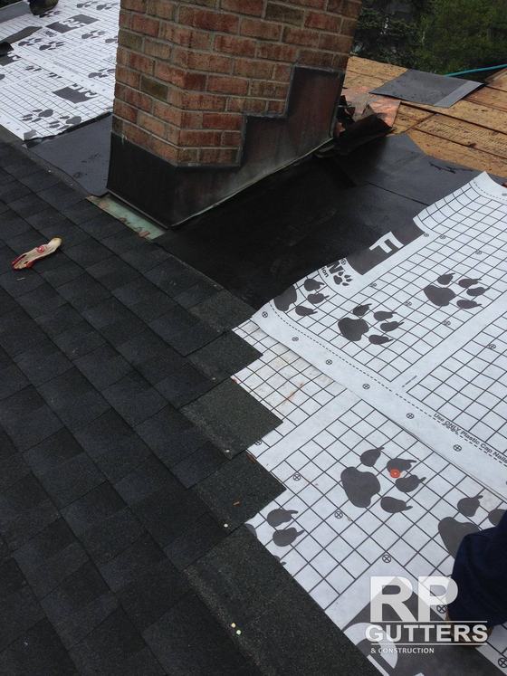Roof underlayment and shingles in progress