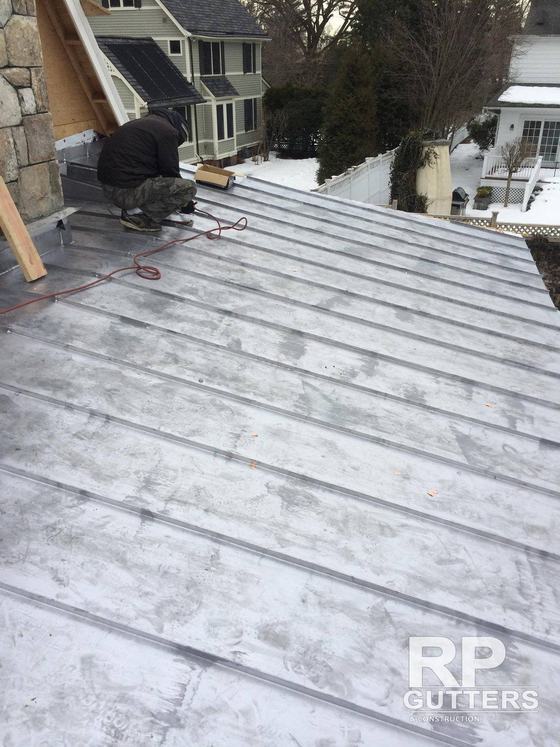 Standing-seam metal roof panels