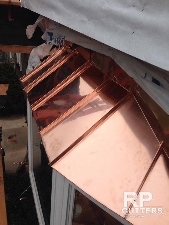 Copper standing-seam roof with raised ribs